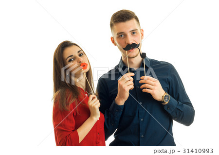cheerful young couple has fun with a sham 31410993