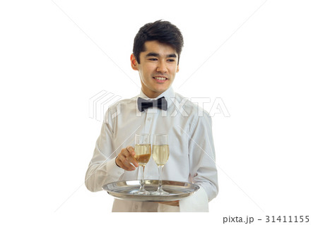 Portrait of a cheerful waiter in a white shirt 31411155