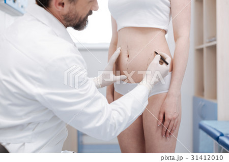 Focused precise plastic surgeon marking problem Focused precise plastic surgeon marking problem 31412010