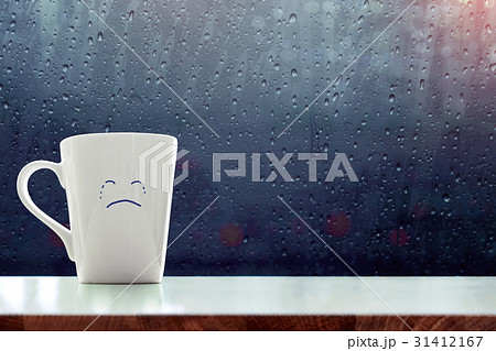 Sadness Coffee Mug with crying face on rainy day Sadness Coffee Mug with crying face on rainy day 31412167