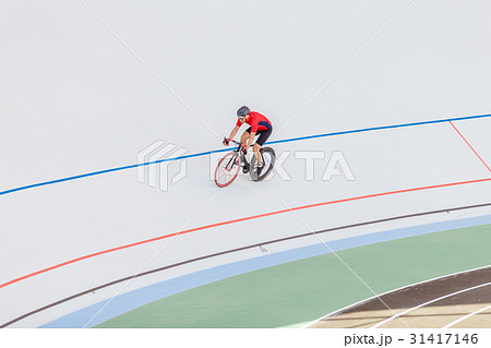 Active man on white velodrome outdoor Active man on white velodrome outdoor 31417146