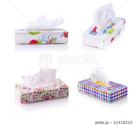 Set of colored boxes with paper napkins on white 31418232