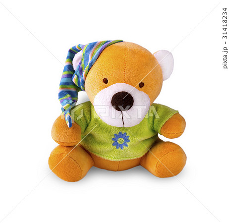 Toy bear in the cap on white background. 31418234