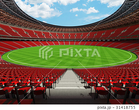 Beautiful modern cricket stadium with red seats 31418755