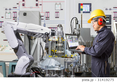 Engineer check robotic in automotive industry Engineer check robotic in automotive industry 31419275