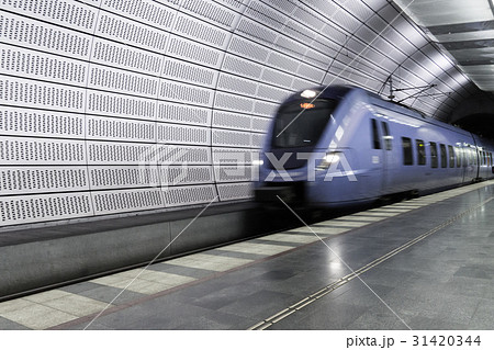 Blue train arrives at the Malmo metro station  31420344
