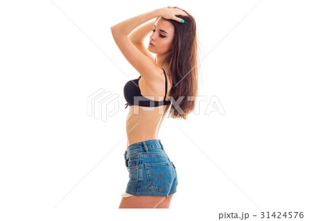 Skinny young brunette with beautiful body in denim Skinny young brunette with beautiful body in denim 31424576
