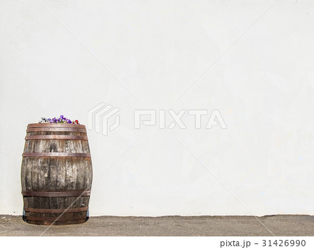 Whisky cask in front of wall 31426990