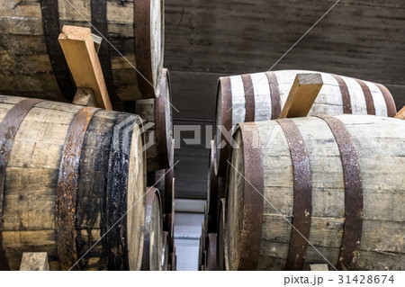 Whisky barrels in the store house 31428674