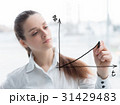 Business woman drawing a concept diagram 31429483