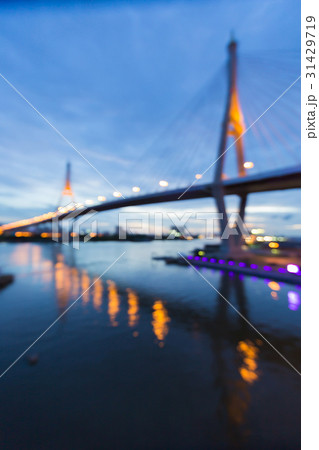Night reflection blurred bokeh light twin bridge 31429719