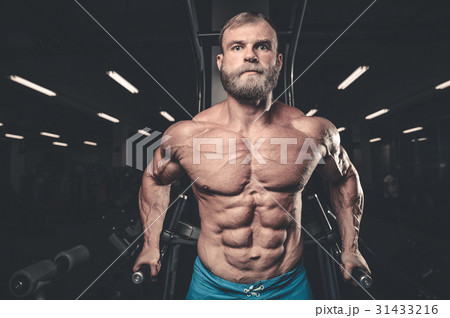 Brutal caucasian handsome fitness men on diet training chest pum 31433216