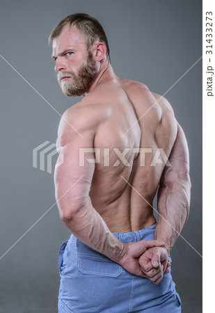 Handsome power athletic man diet training pumping up back muscle Handsome power athletic man diet training pumping up back muscle 31433273
