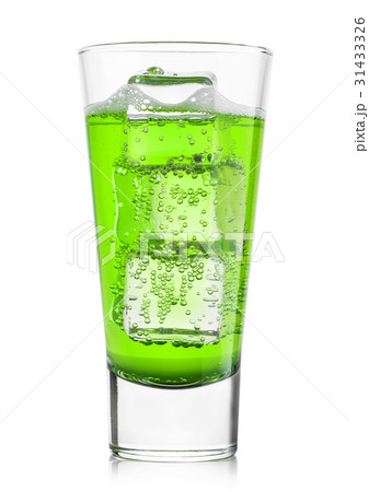Glass of citrus green lemonade with ice cubes Glass of citrus green lemonade with ice cubes 31433326