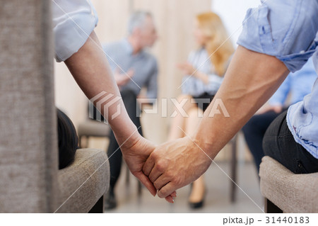 Nice pleasant people holding their hands 31440183