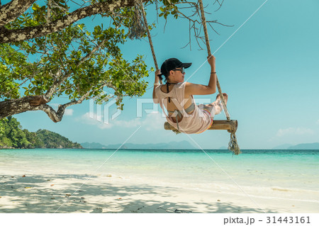women and swing at beach women and swing at beach 31443161