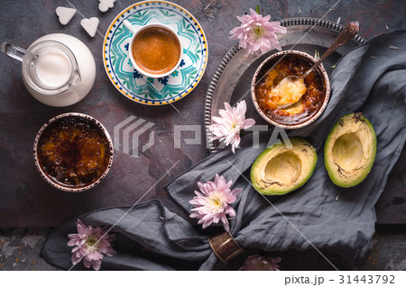 Still life with creme brulee and coffee on stone 31443792