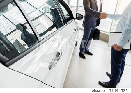 Business deal concerning purchase of new car 31444525