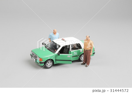 small figure with green taxi at hk 31444572
