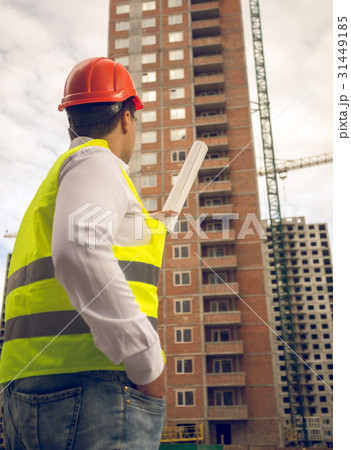 construction engineer pointing at building construction engineer pointing at building 31449185