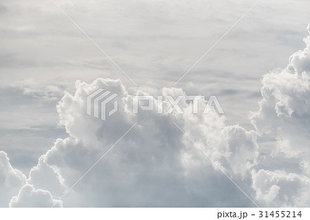 White sky and puffy cloud. 31455214