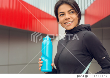 Young woman active exercise workout on street 31455475