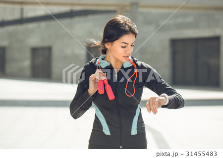 Young woman active exercise workout on street 31455483