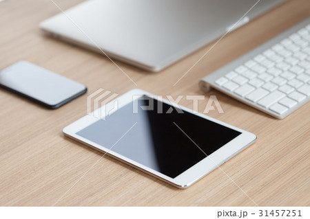 modern communicator device on desk side view 31457251