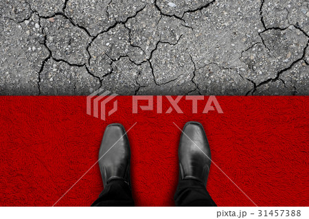 Black shoes standing at the edge of rich and poor 31457388
