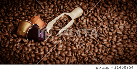 Coffee capsule with coffee beans Coffee capsule with coffee beans 31460354