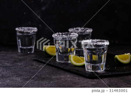 Tequila shot with lime and salt Tequila shot with lime and salt 31463001