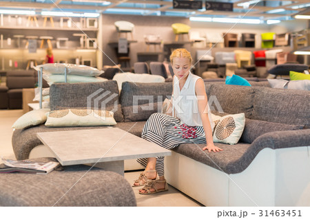 Woman shopping for furniture, sofa and home decor Woman shopping for furniture, sofa and home decor 31463451
