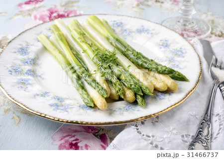 Green and White Asparagus on Plate 31466737