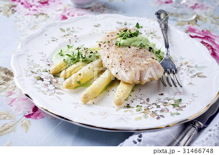 Cod Filet with White Asparagus on Plate 31466748
