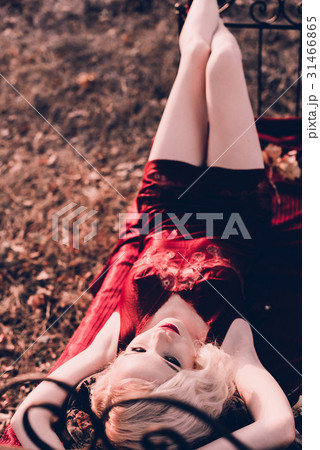 Beautiful and elegant blonde woman with red lips Beautiful and elegant blonde woman with red lips 31466865