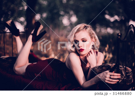 Beautiful and elegant blonde woman with red lips 31466880