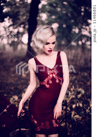 Beautiful and elegant blonde woman with red lips 31466891