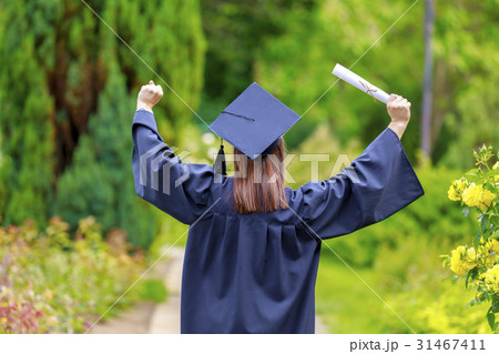 Young woman in graduation day celebrating 31467411