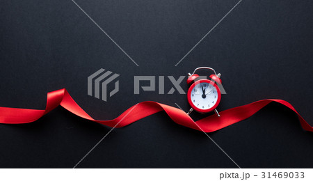 alarm clock and ribbon alarm clock and ribbon 31469033