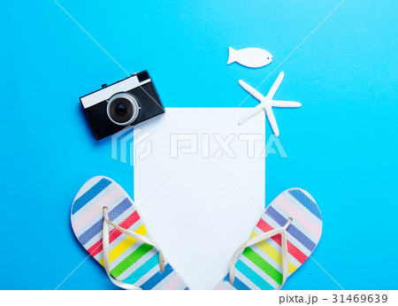 sandals, sheet of paper, camera, starfish and toy sandals, sheet of paper, camera, starfish and toy 31469639