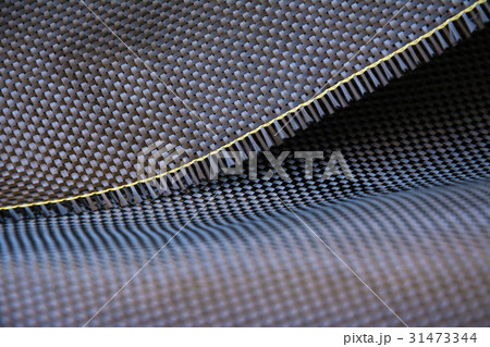 Carbon fiber composite raw material background 31473344
