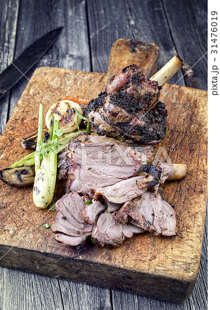 Lamb Knuckle with Vegetable on Cutting Board 31476019