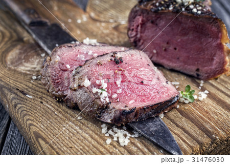 Barbecue Point Steak on old Chopping Board 31476030