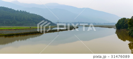 Torrential water on river in flood season Torrential water on river in flood season 31476089