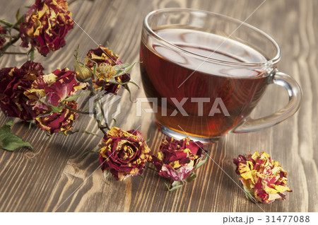 Cup of tea and dry roses Cup of tea and dry roses 31477088