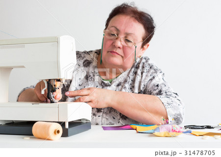 patchwork and quilting at the workshop of a tailor 31478705