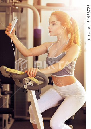 Young woman training in gym Young woman training in gym 31478723