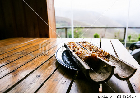 fried rice in bamboo trunk close up 31481427