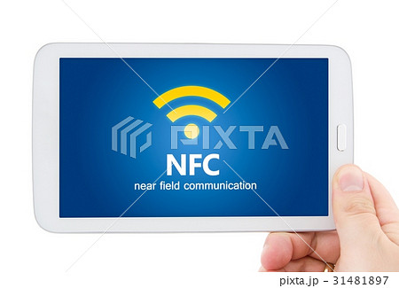 Hand holding tablet with NFC 31481897