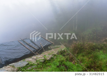 fog over hut in Tiantouzhai village in spring 31482015